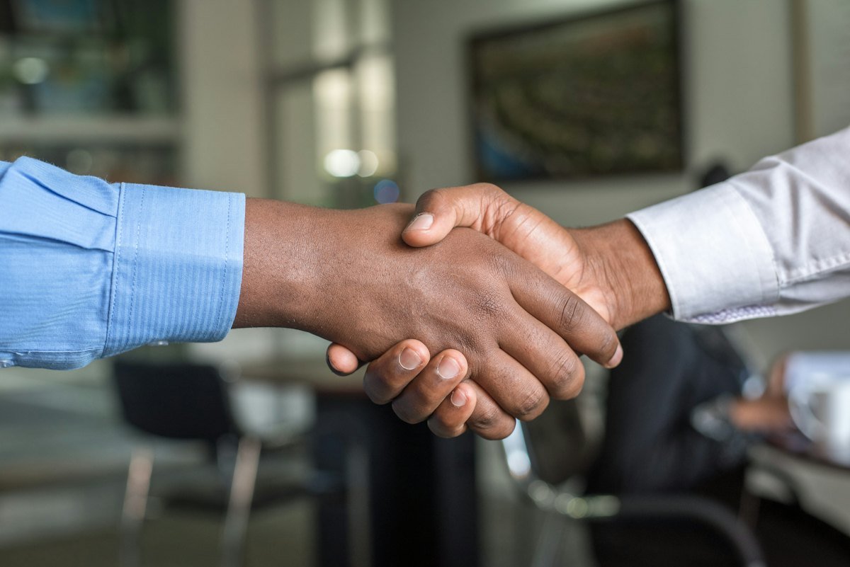 Employer and recruiter handshake